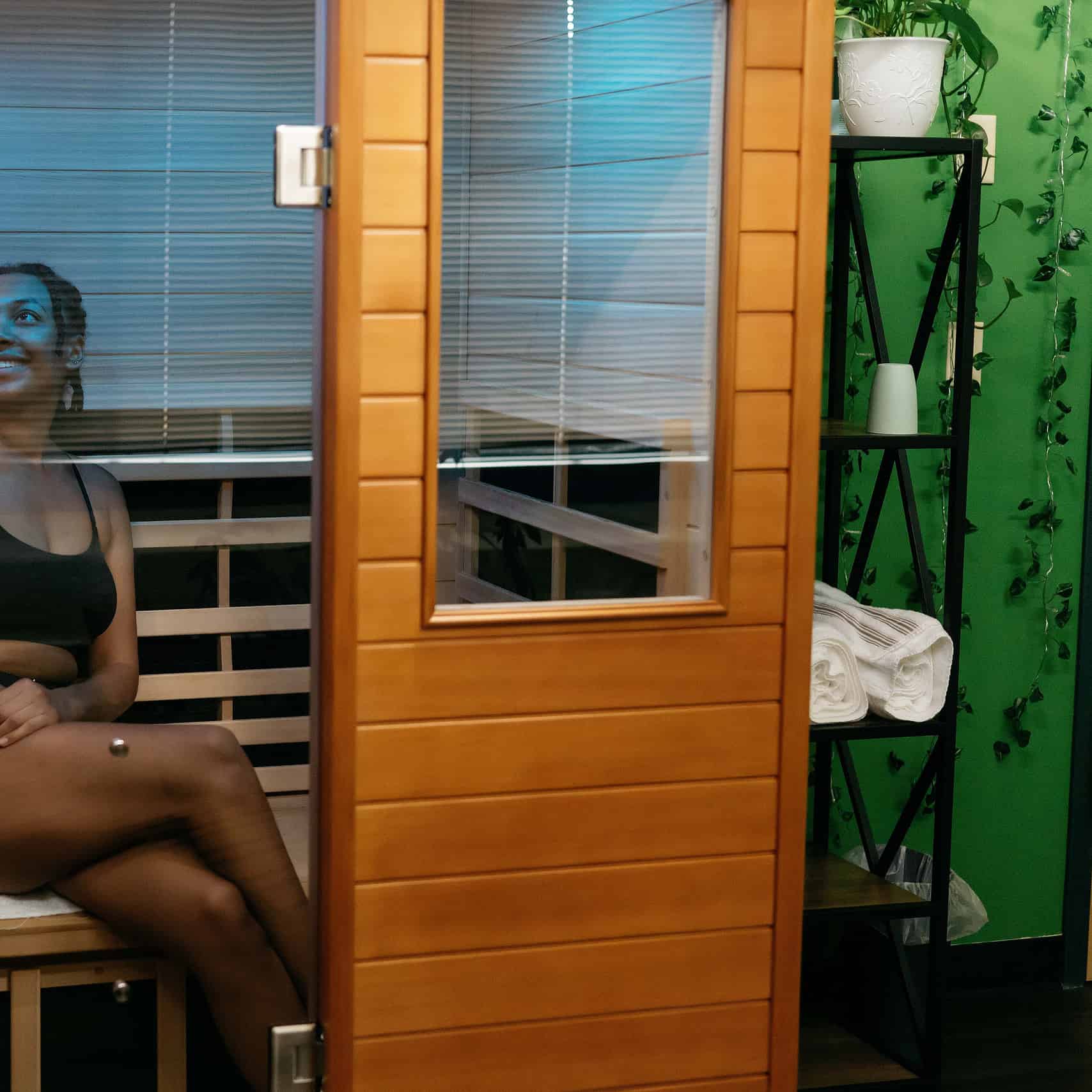 Woman smiling in private infrared sauna
